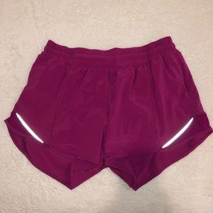 SIZE 10 4IN RASPBERRY PINK LULULEMON HOTTY HOT SHORTS